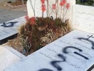Организации Палестины осудили осквернение христианского кладбища
