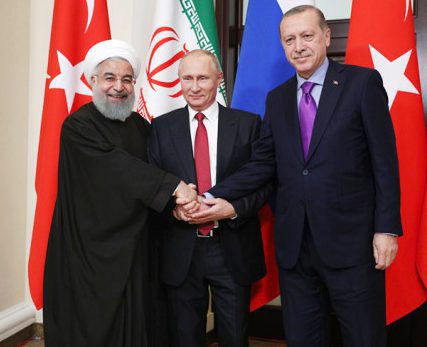 Путин в исламском антураже. Что стоит за встречей в Анкаре